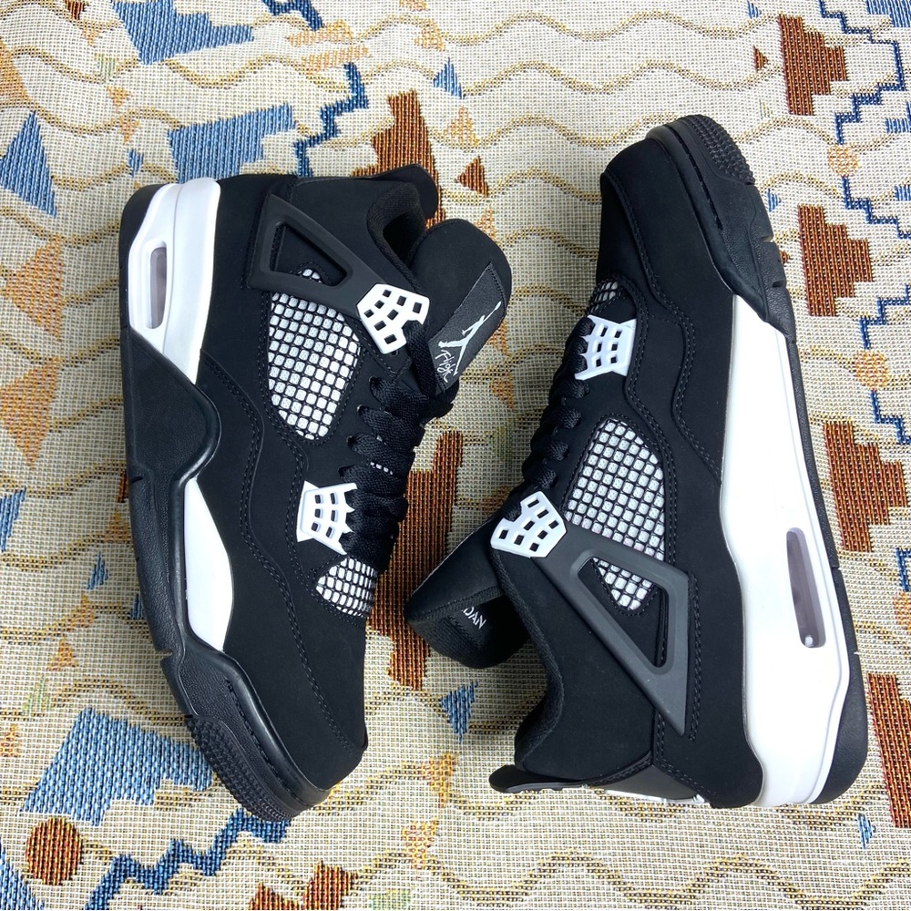 Brand New Retro 4 White
Thunder- Men's Black and White
Sneakers